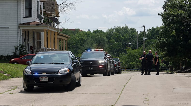 Police pictured responding to a double shooting on the 500 block of Park Place that left two people hospitalized on Friday, June 20, 2025, in Springfield. JOSEPH COOKE/STAFF