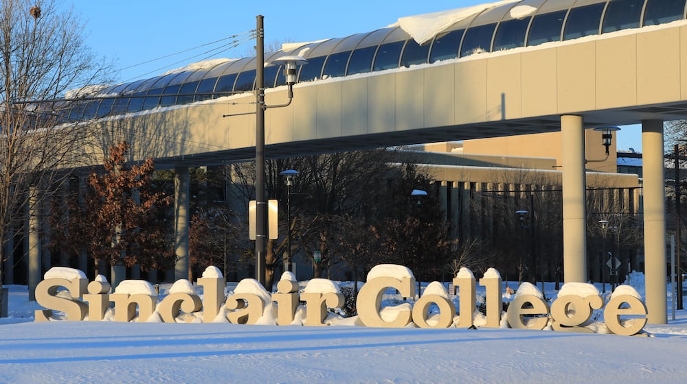 Sinclair Community College resumed in-person classes on Tuesday, about 36 hours after snow stopped Sunday evening. Much of the area received over a foot of snow. Most area universities had resumed in-person classes by Wednesday, though Wright State will continue to be remote by the end of the week. BRYANT BILLING/STAFF