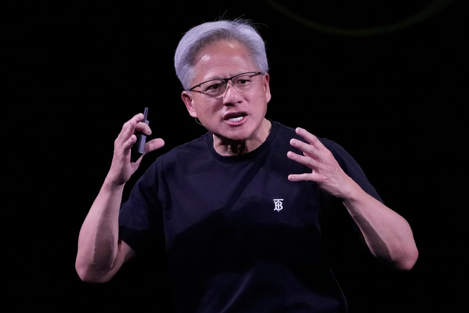 NVIDIA CEO Jensen Huang delivers his keynote address Wednesday, June 11, 2025 at the Vivatech fair in Paris. (AP Photo/Michel Euler)