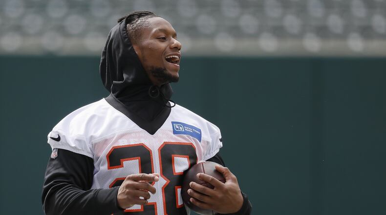 Cincinnati Bengals running back Joe Mixon walks the sidelines during NFL football practice in June at Cincinnati. (AP Photo/John Minchillo)