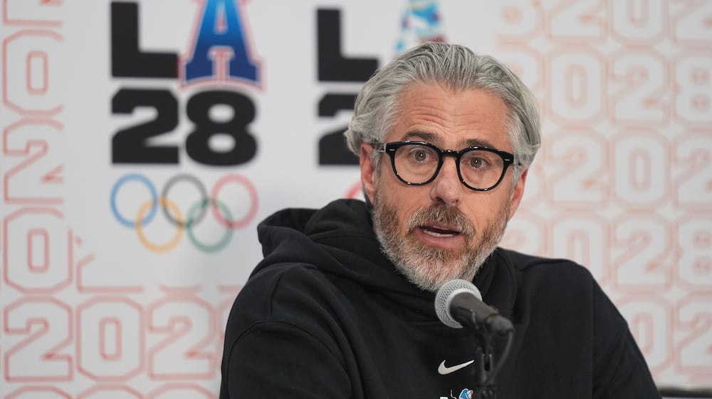 FILE - Casey Wasserman, LA28 chairperson and president, takes questions from the media during a news conference in Los Angeles, Thursday, June 5, 2025. (AP Photo/Damian Dovarganes, File)
