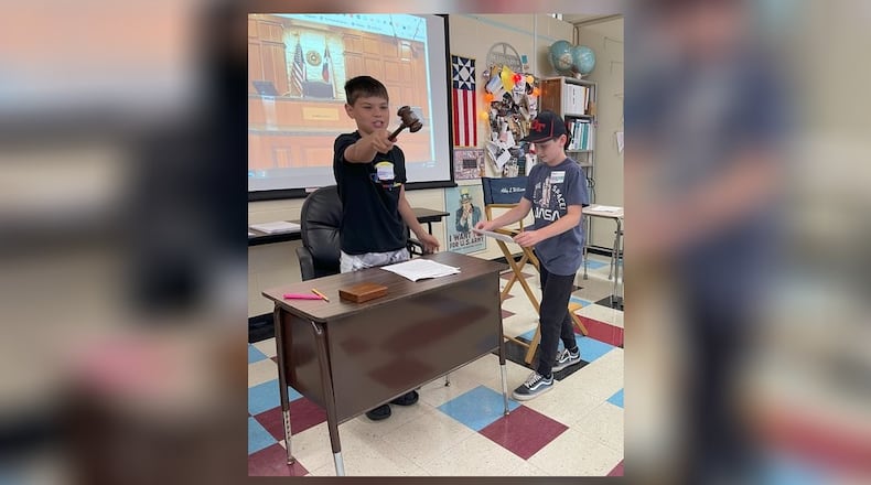 Springfield-Clark CTC students in last year's Mock Trial Experience summer camp stepped into the courtroom, taking on the roles of attorneys, jurors, and judges. In this photo, one camper delivers the jury’s verdict while another steps back from the bench, gaining firsthand experience in the legal process. This year's Summer Camp offers two sessions of Justice in Action: Mock Trial Experience. Contributed