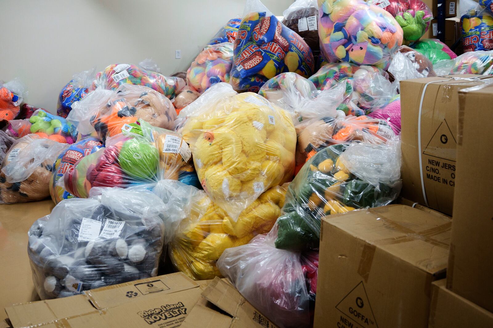 Bags of toy prizes at the Playland's Castaway Cove amusement park storage facility, in Ocean City, N.J, on Friday, June 6, 2025. (AP Photo/Mingson Lau)