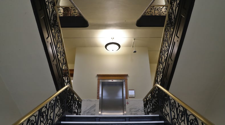The grand staircase in the newly renovated A.B. Graham Building with a new elevator. BILL LACKEY/STAFF