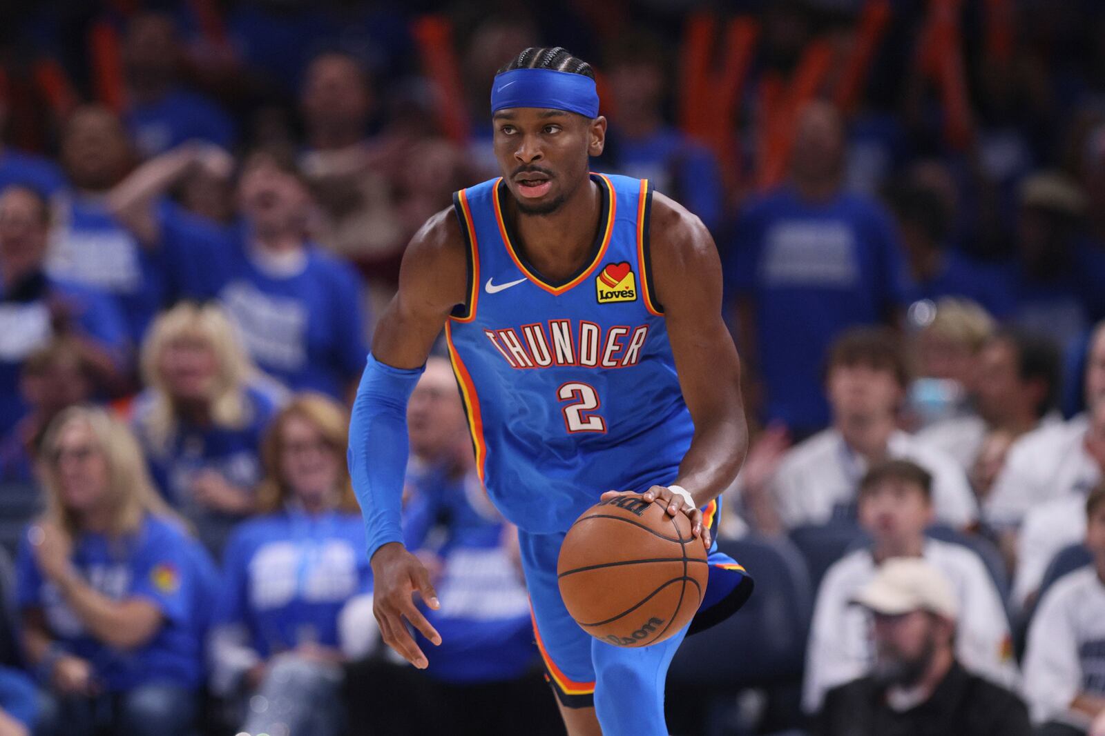 Oklahoma City Thunder guard Shai Gilgeous-Alexander (2) dribbles down the court during the second half of Game 5 of the Western Conference finals of the NBA basketball playoffs against the Minnesota Timberwolves, Wednesday, May 28, 2025, in Oklahoma City. (AP Photo/Nate Billings)