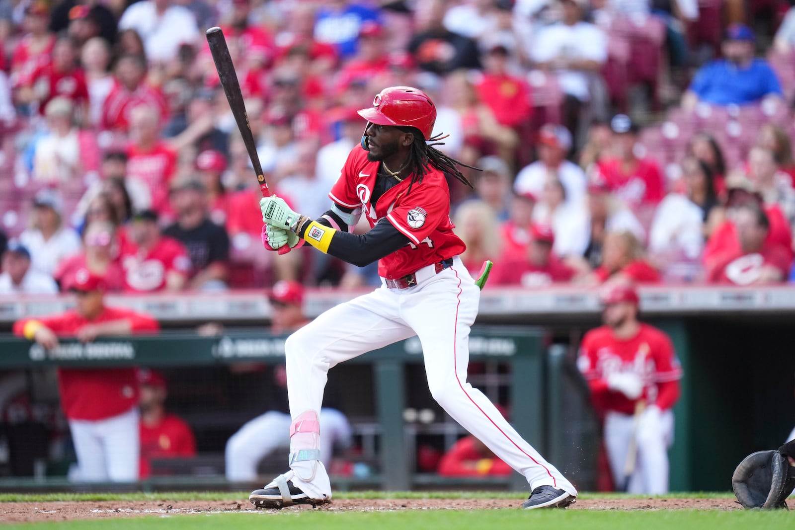 Cincinnati Reds' Elly De La Cruz watches his RBI double during the sixth inning of a baseball game against the New York Mets, Sunday, Sept. 7, 2025, in Cincinnati. (AP Photo/Jeff Dean)