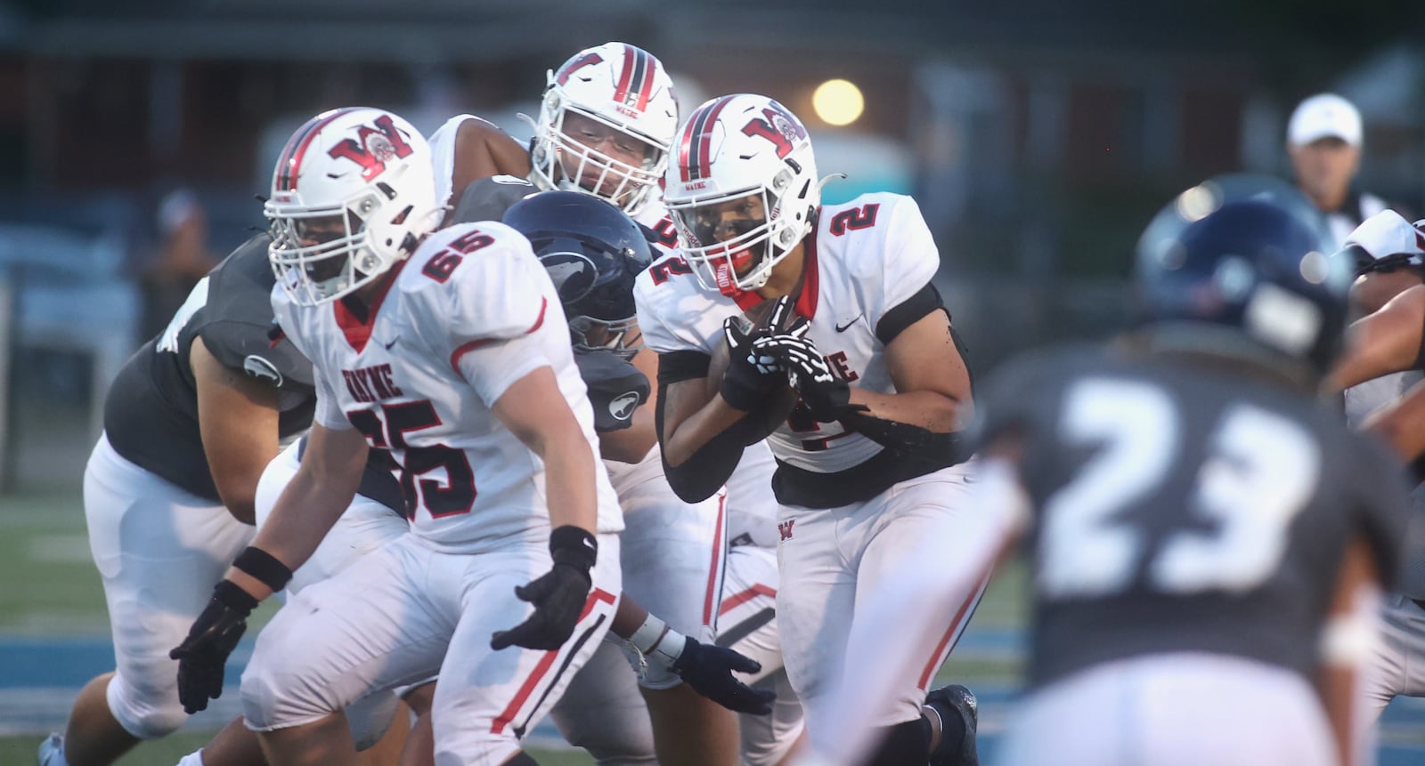 Wayne's Isaiah Thompson runs against Fairmont on Friday, Sept. 19, 2025, at Roush Stadium in Kettering. David Jablonski/Staff