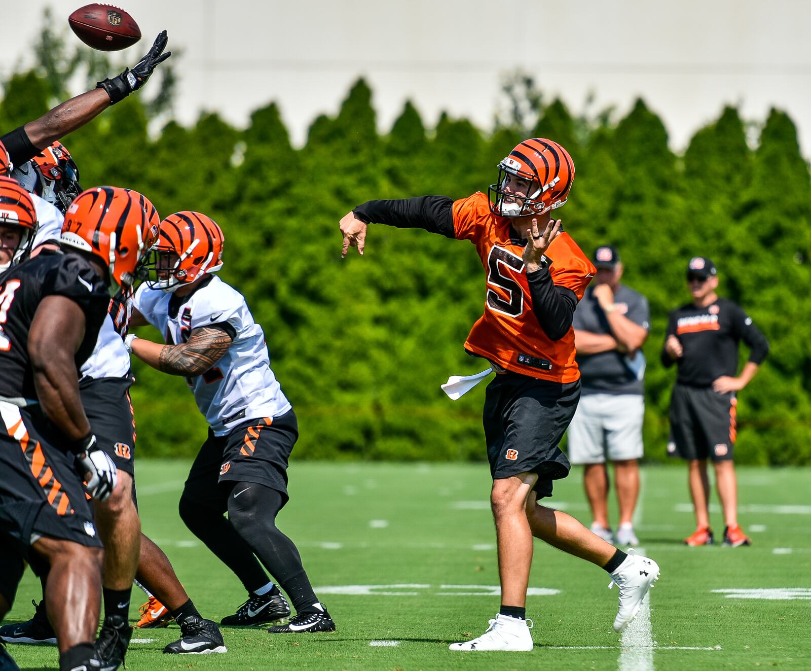 Quarterback AJ McCarron throws a pass during the first day of Cincinnati Bengals Training Camp Friday, July 28 at the practice fields beside Paul Brown Stadium in Cincinnati. NICK GRAHAM/STAFF