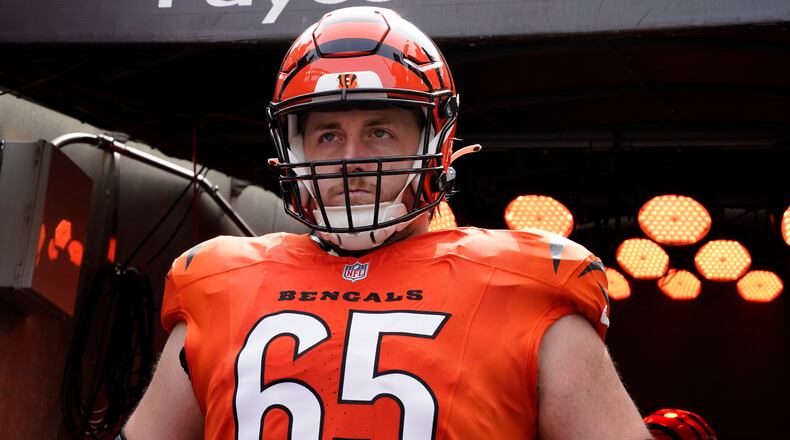 Cincinnati Bengals guard Alex Cappa (65) waits to run onto the field before an NFL football game against the New England Patriots, Sunday, Sept. 8, 2024, in Cincinnati. (AP Photo/Jeff Dean)