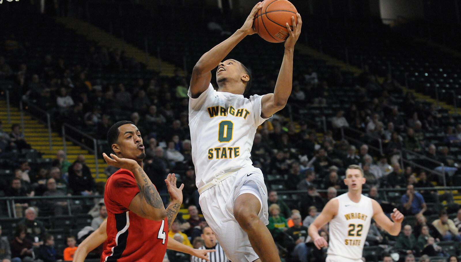 Wright State freshman Jaylon Hall drives to the basket for two of his 16 points in Monday’s 77-67 win against Youngstown State at the Nutter Center. KEITH COLE/CONTRIBUTED PHOTO
