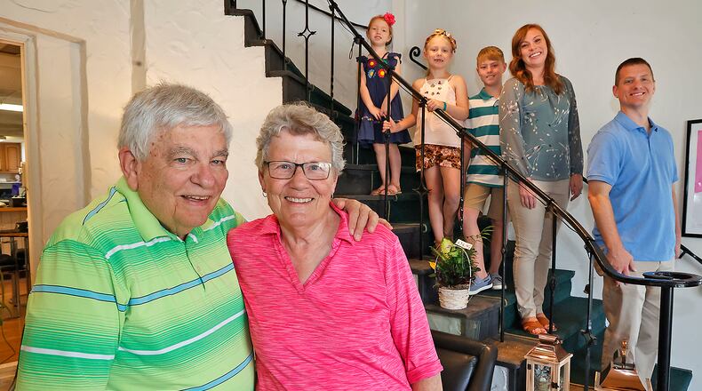 Bill and Cathy Ardle is selling Schneider's Florist after 53 years to the Ashley and Matt Nienaber, pictured with their kids, from left, Janie, Ellie and Deacon. BILL LACKEY/STAFF