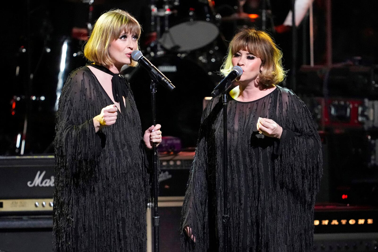 FILE - Holly Laessig, left, and Jess Wolfe of Lucius perform at the 8th annual Love Rocks NYC concert on March 7, 2024, in New York. (Photo by Charles Sykes/Invision/AP, File)