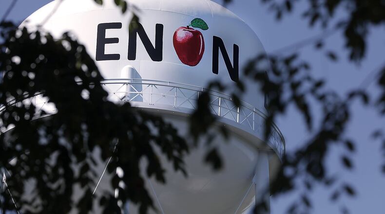 High above the Village of Enon the water tower has been painted with a big red apple. What a perfect way to mark the 40th Anniversary of the Apple Butter Festival October 12 and 13. BILL LACKEY/STAFF