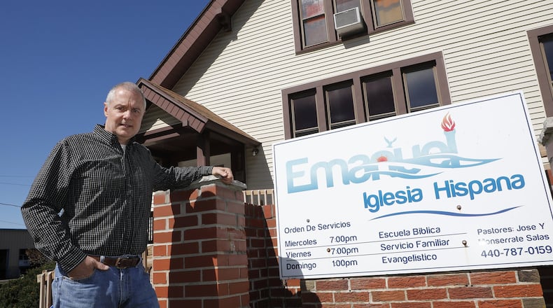 Carl Ruby in front of the Emanuel Iglesia Hispana church on East Main Street. Ruby, a local minister, is the head of a pro-immigration group and spoke to Rotary this week. Bill Lackey/Staff