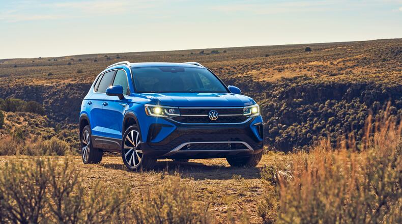 This photo provided by Volkswagen shows a new 2022 Volkswagen Taos compact crossover SUV. It's one of the smallest and most affordable SUVs on sale today yet offers lots of features and pleasing performance. (Courtesy of Volkswagen of America via AP)