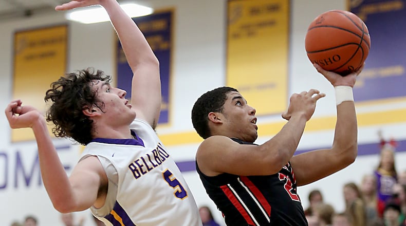 Franklin guard Ryan Montgomery shoots while covered by Bellbrook forward Jack Campbell during their game at Bellbrook Friday, Dec. 16, 2016. Contributed photo/E.L. Hubbard