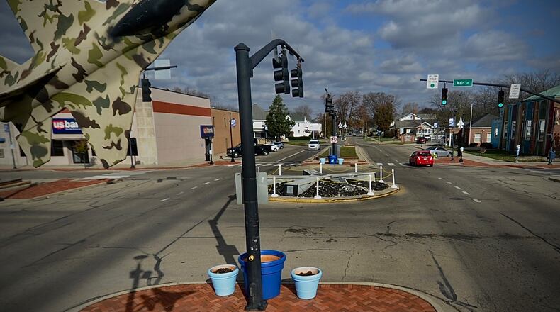 The Main Street and Central Avenue traffic circle in downtown Fairborn may be converted into a roundabout to improve flow and safety. MARSHALL GORBY\STAFF