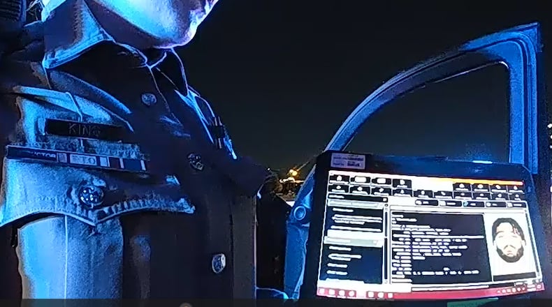 This image taken from video provided by Texas Department of Public Safety shows bodycam footage of law enforcement looking up information about Cowboys defensive end Marshawn Kneeland while searching for him, Nov. 5, 2025, in Frisco, Texas. (Texas Department of Public Safety via AP)