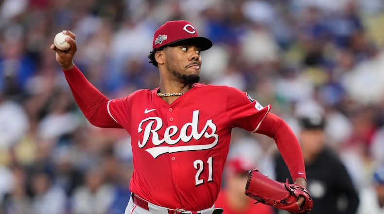 FILE Cincinnati Reds starting pitcher Hunter Greene throws to a Los Angeles Dodgers batter during the first inning in Game 1 of the National League Wild Card baseball playoff series, Sept. 30, 2025, in Los Angeles. (AP Photo/Mark J. Terrill, file)