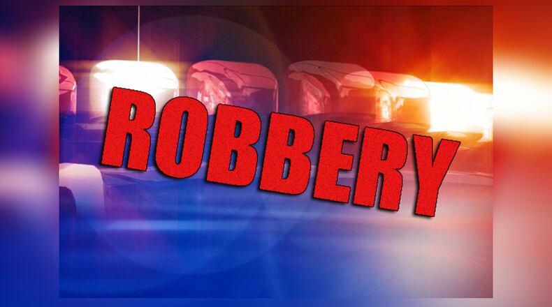 Three masked men use guns and macheted to rob a Springfield apartment on Delta Road.