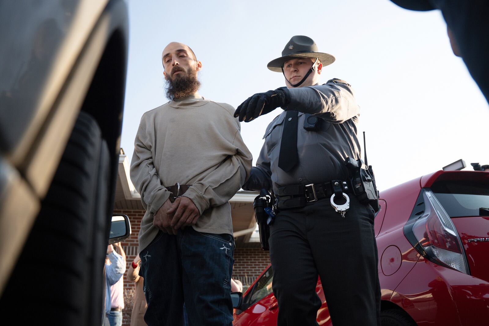 Cody Balmer is escorted from court after his preliminary arraignment on Monday, April 14, 2025, in Harrisburg, Pa. (AP Photo/Mingson Lau)