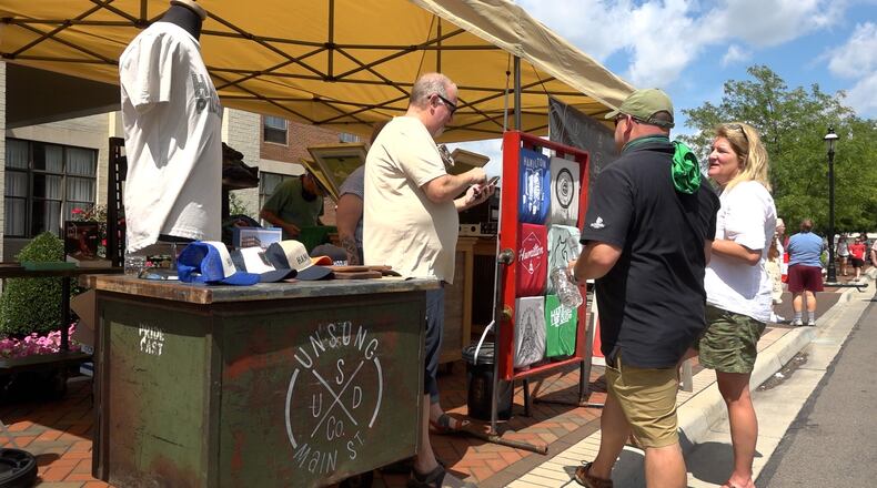 Pictured are scenes from the 2021 Hamilpalooza, a business festival that features vendors, food trucks and live music, that is held annually at Marcum Park. This year they'll have a biergarten. PROVIDED/TVHamilton