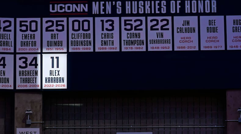 UConn forward Alex Karaban's name and number is highlighted during a pregame ceremony adding Karaban to the Huskies of Honor before an NCAA college basketball game between UConn and Seton Hall, Saturday, Feb. 28, 2026, in Storrs, Conn. (AP Photo/Jessica Hill)