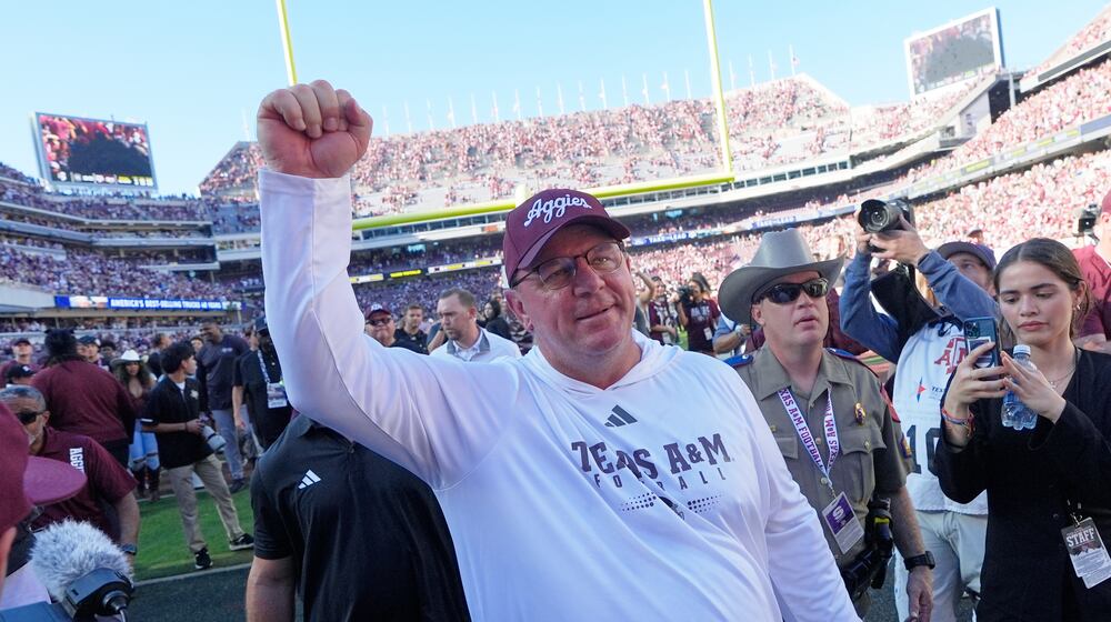 Texas A&M head coach Mike Elko celebrates after an NCAA college football game against South Carolina Saturday, Nov. 15, 2025, in College Station, Texas. (AP Photo/David J. Phillip)