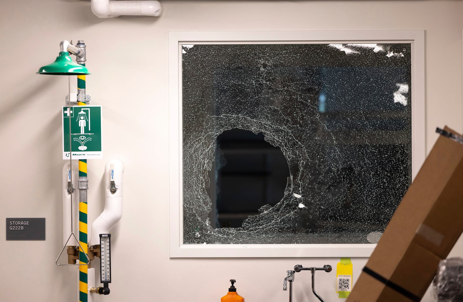 A shattered window is seen inside the Interdisciplinary Engineering Building on University of Washington's campus after pro-Palestinian protesters occupied the building, Tuesday, May 6, 2025, in Seattle. (Nick Wagner/The Seattle Times via AP)