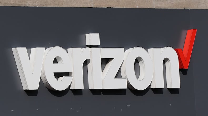 FILE - A Verizon sign is displayed on a store, Sept. 30, 2025, in Cambridge, Mass. (AP Photo/Charles Krupa, file)