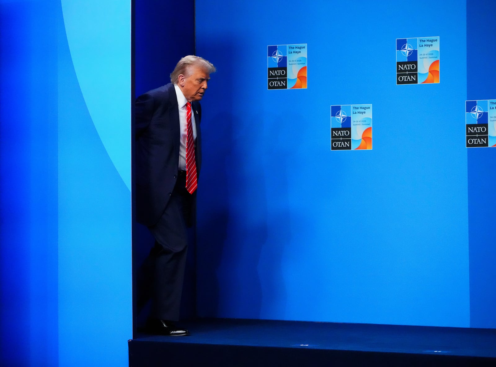 U.S. President Donald Trump arrives to be officially greeted by NATO Secretary General Mark Rutte and Netherland's Prime Minister Dick Schoof at the NATO Summit in The Hauge, Netherlands on Wednesday, June 25, 2025. (Sean Kilpatrick/The Canadian Press via AP)