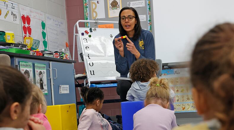 Stephanie Jones, a teacher in the Springfield City Schools District, teaches a pre-school class at Clark School Thursday, Feb. 9, 2023. BILL LACKEY/STAFF