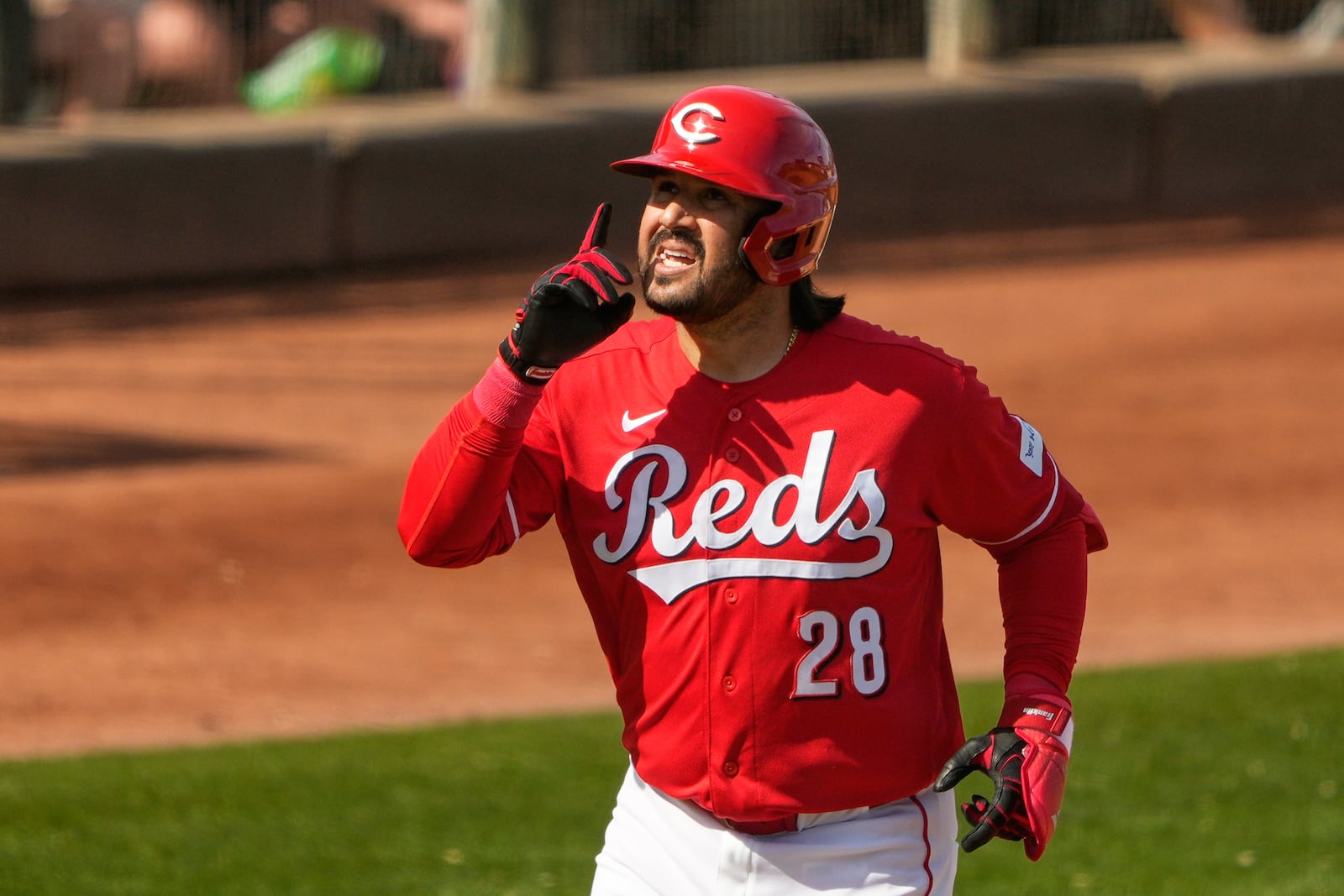 Cincinnati Reds' Eugenio Suárez celebrates his home run against the Kansas City Royals during the fifth inning of a spring baseball game in Goodyear, Ariz., Tuesday, Feb. 24, 2026. (AP Photo/Chris Carlson)