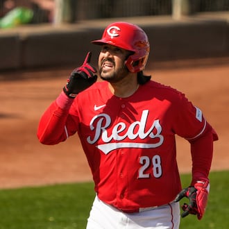 Cincinnati Reds' Eugenio Suárez celebrates his home run against the Kansas City Royals during the fifth inning of a spring baseball game in Goodyear, Ariz., Tuesday, Feb. 24, 2026. (AP Photo/Chris Carlson)