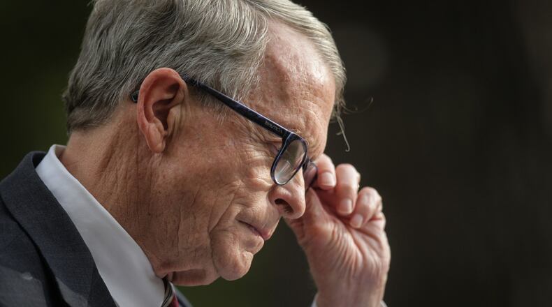Ohio Gov. Mike DeWine talks to the press Friday October 9, 2020 at the Patterson Homestead on Brown St. in Dayton. DeWine traveled around Ohio on Friday because he was worried about the recent COVID-19 up tick. JIM NOELKER/STAFF