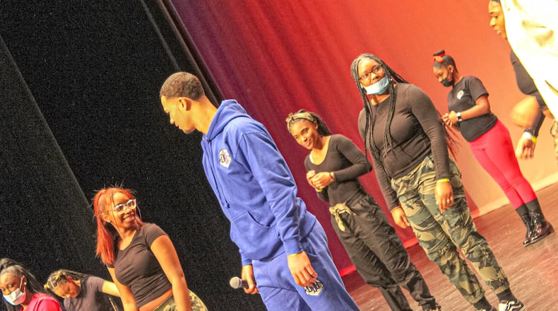 Co-Host and Springfield High School senior Delian Bradley introduces the Springfield High School Dance Team for a Showcase Performance at the Dance Stomp Shake competition on Feb. 27. Contributed