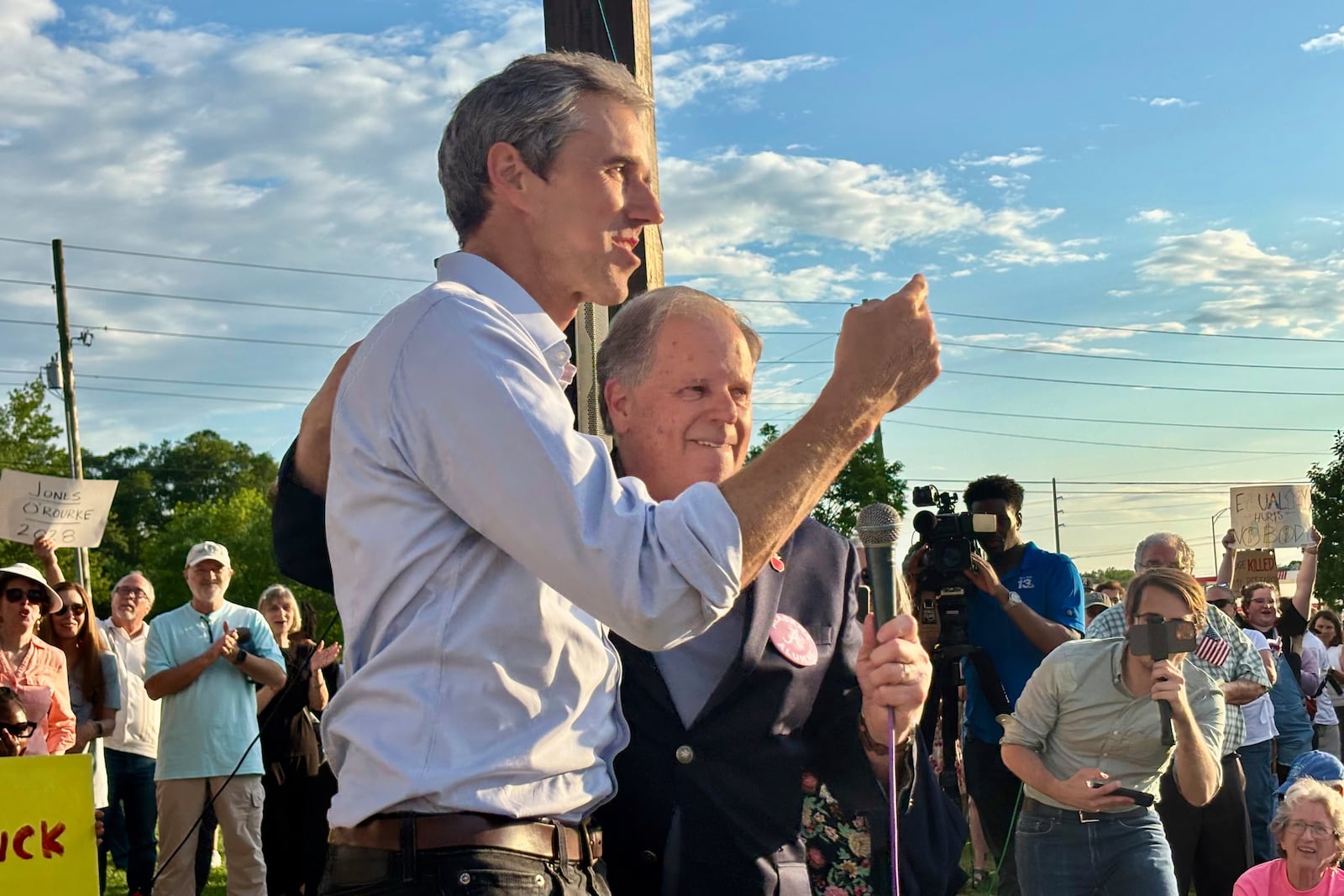 Former presidential candidate Beto O'Rourke of Texas speaks next to former U.S. Sen. Doug Jones of Alabama at a rally called "Tide Against Trump" in Tuscaloosa, Ala., held in opposition to President Donald Trump's appearance on campus on Thursday, May 1, 2025. (AP Photo/Kimberly Chandler)