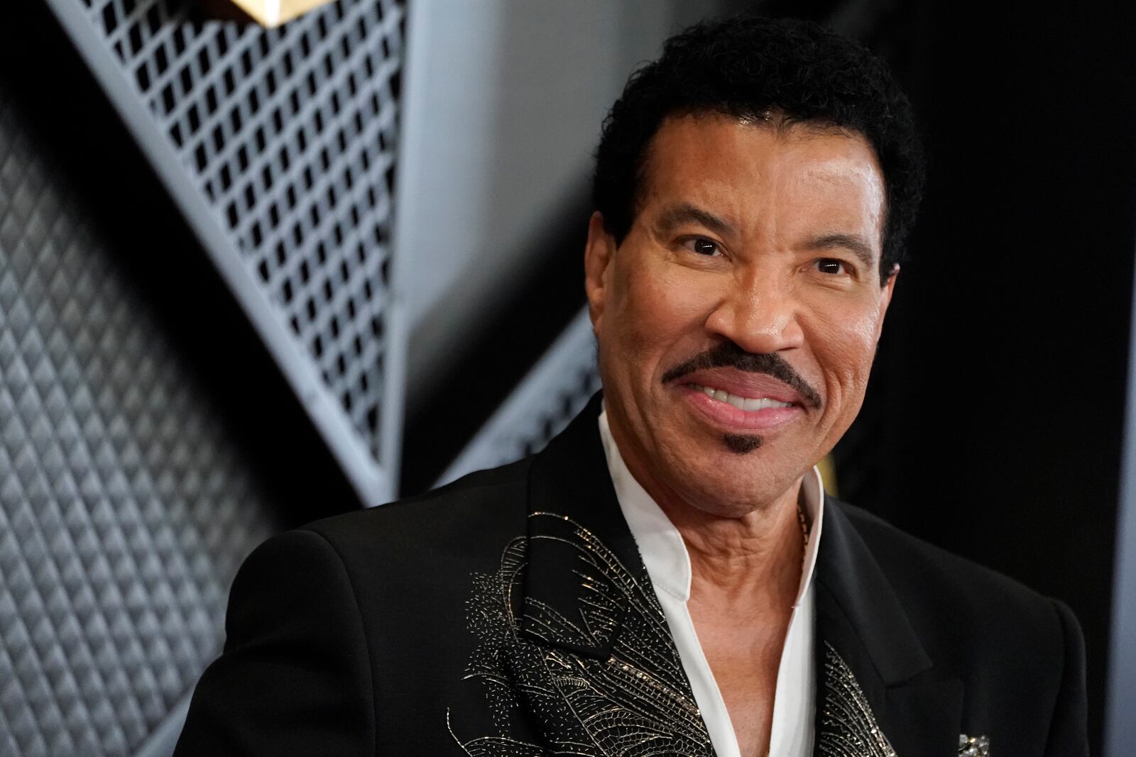 Lionel Richie arrives at the 66th annual Grammy Awards on Sunday, Feb. 4, 2024, in Los Angeles. (Photo by Jordan Strauss/Invision/AP)