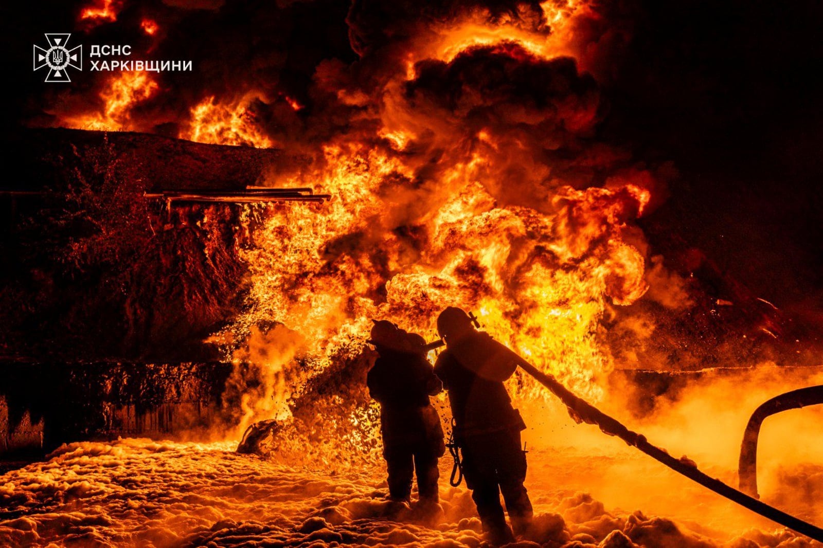 FILE - In this photo provided by the Ukrainian Emergency Service, emergency services personnel work to extinguish a fire following a Russian attack in Kharkiv region, Ukraine, July 5, 2025. (Ukrainian Emergency Service via AP, file)