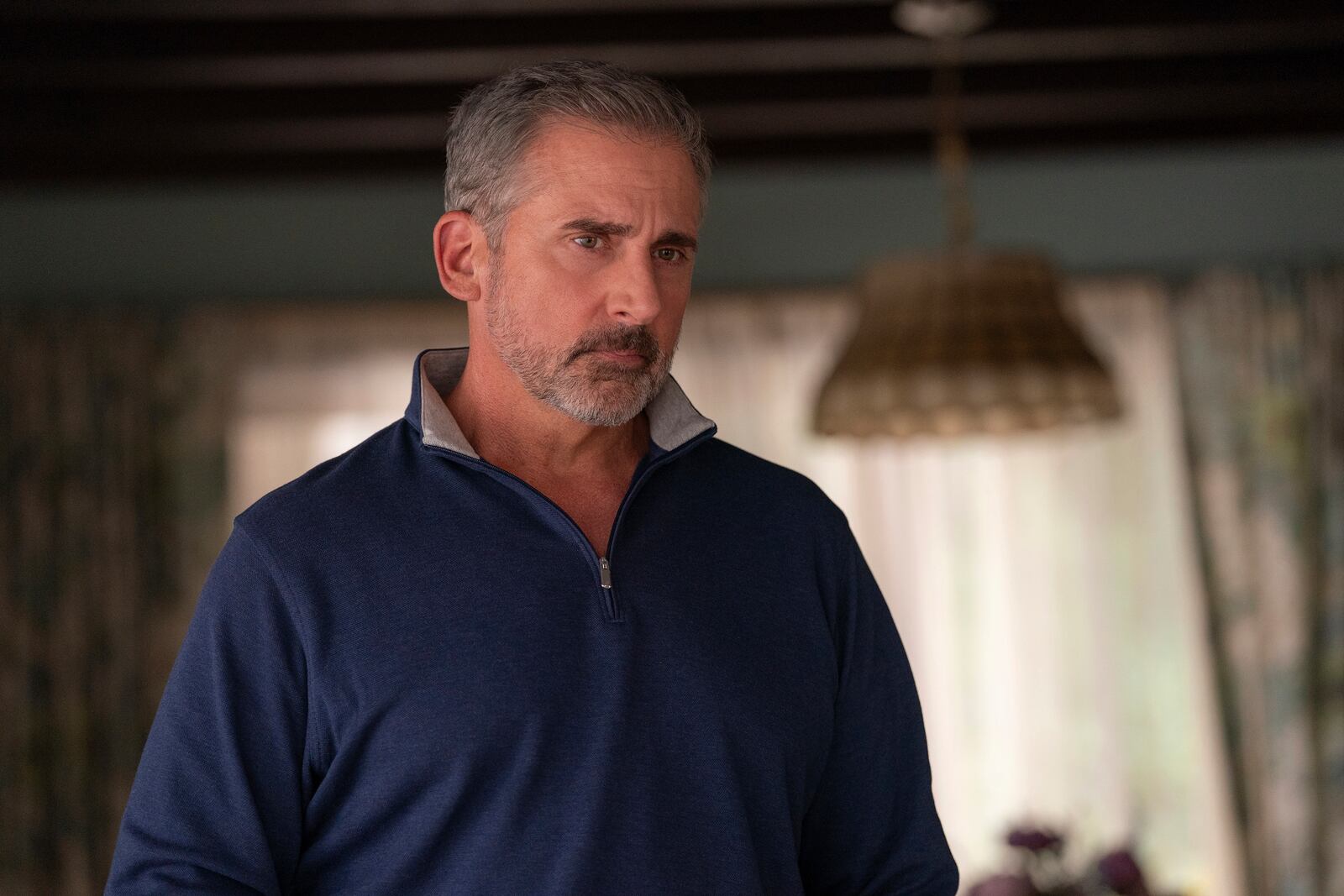 This image released by Netflix shows Steve Carell in a scene from "The Four Seasons". (Jon Pack/Netflix via AP)