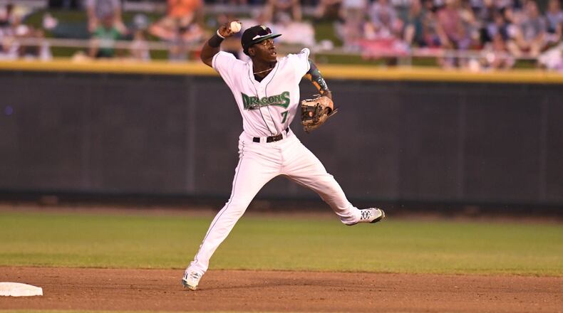 Dragons second baseman Hector Vargas makes a play during Wednesday night’s 7-0 defeat of West Michigan at Fifth Third Field. NICK FALZERANO / CONTRIBUTED