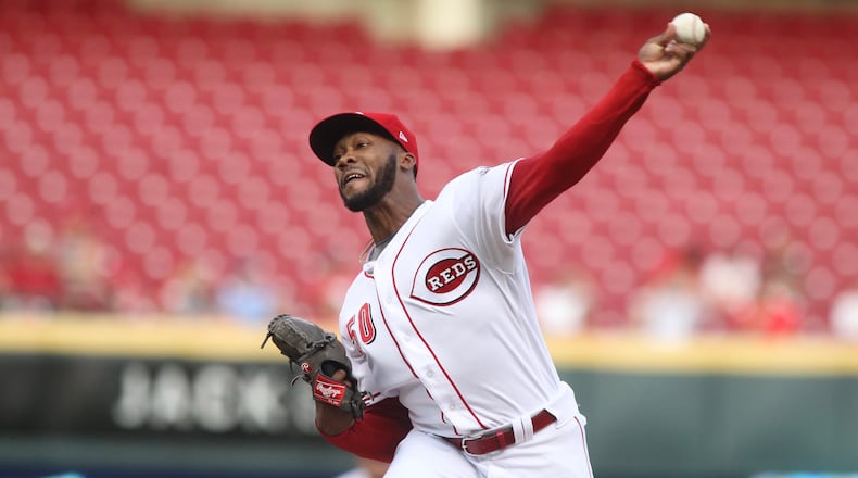 Reds starter Amir Garrett pitches against the Orioles on Wednesday, April 19, 2017, at Great American Ball Park in Cincinnati. David Jablonski/Staff
