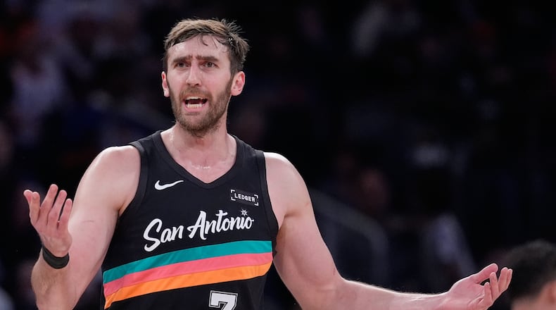 San Antonio Spurs' Luke Kornet reacts to a call during the first half of an NBA basketball game against the New York Knicks Sunday, March 1, 2026, in New York. (AP Photo/Seth Wenig)