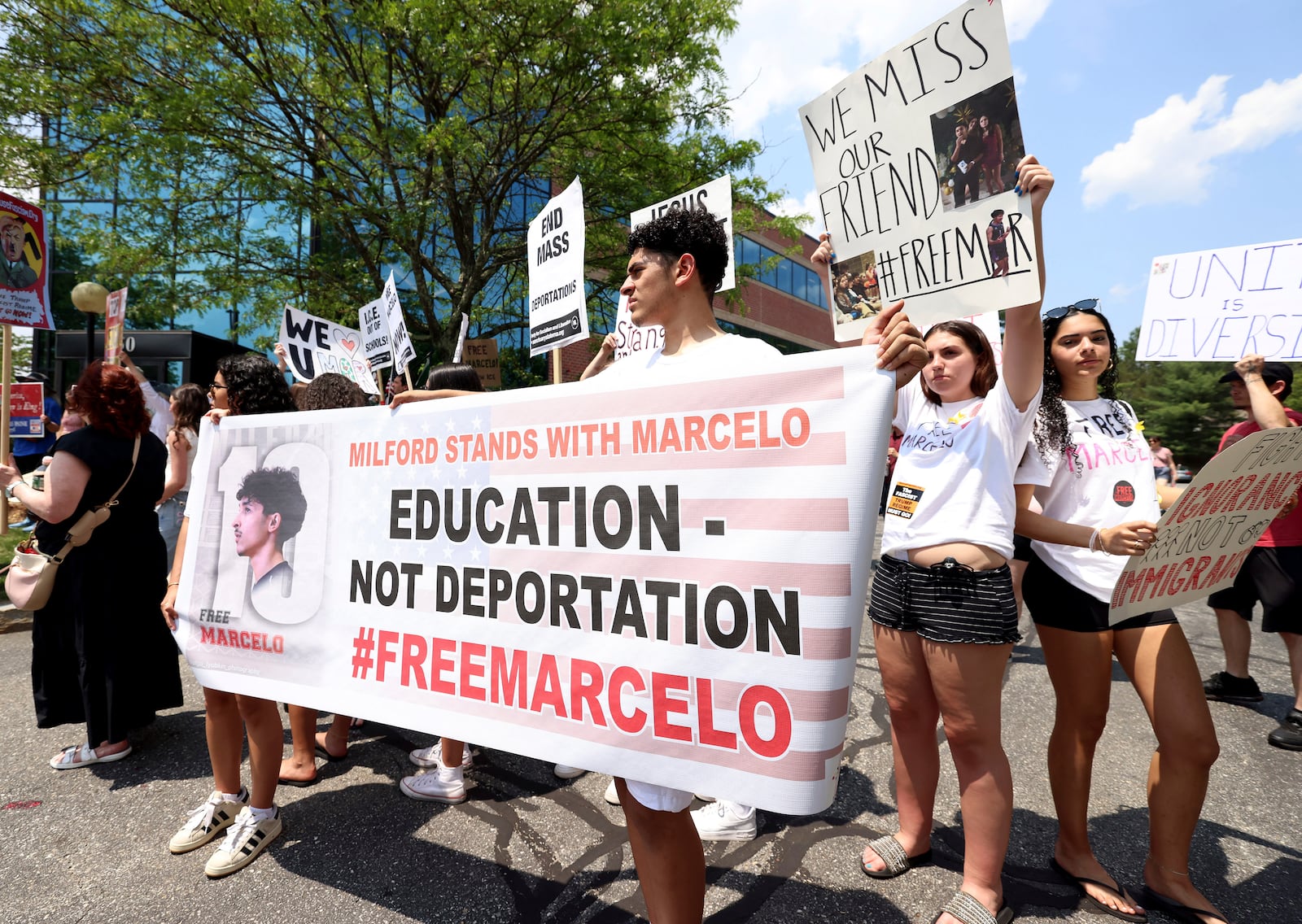 Supporters gather outside federal court in support of Marcelo Gomes da Silva, who was arrested on his way to volleyball practice last weekend, on Thursday, June 5, 2025 in Milford, Mass. (AP Photo/Mark Stockwell) (AP Photo/Mark Stockwell)