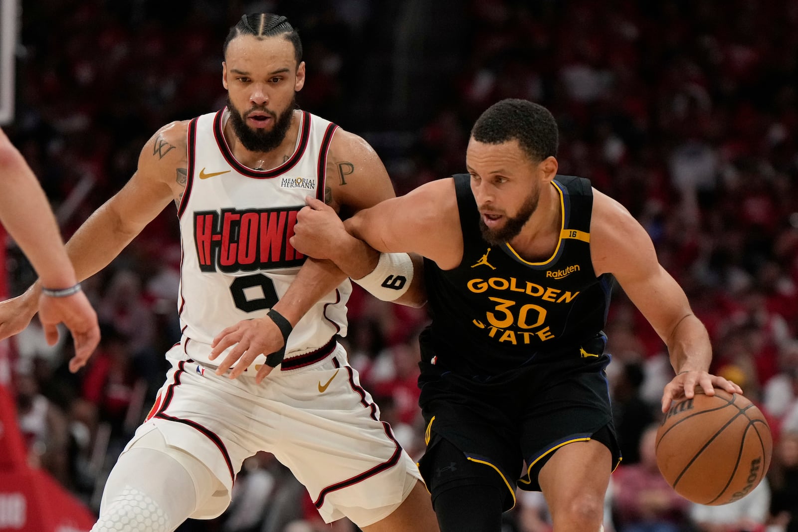Golden State Warriors' Stephen Curry (30) is fouled by Houston Rockets' Dillon Brooks (9) during the second half of Game 7 of an NBA basketball first-round playoff series Sunday, May 4, 2025, in Houston. (AP Photo/Ashley Landis)