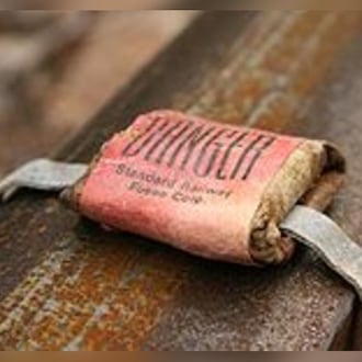 A railroad torpedo, once common in the railroad business.