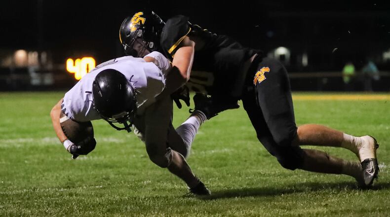 Shawnee High School sophomore Zain Deweese tackles Graham sophomore Jakob Hoke during their game on Friday, Oct. 10 in Springfield. The Falcons won 42-7. CONTRIBUTED PHOTO