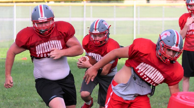 Southeastern High School freshman quarterback Wade Eriksen runs the ball during a practice in South Charleston on Thursday, Aug. 3, 2018. MICHAEL COOPER / CONTRIBUTED