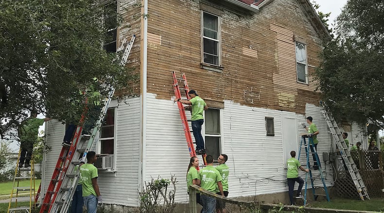 Around 100 WSU Air Force ROTC students worked with UD and Cedarville students to clean up a Dayton neighborhood last month.