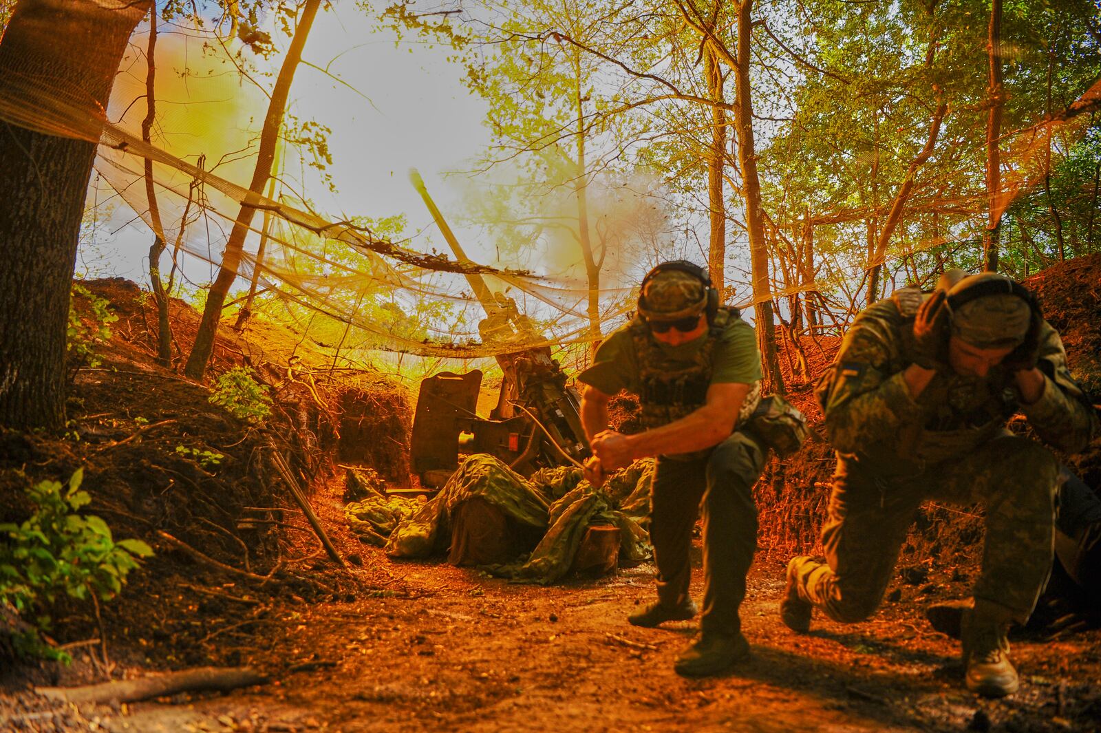 FILE - In this photo provided by Ukraine's 127th Separate Brigade of the Territorial Defense press service, soldiers fire toward Russian army positions near Kharkiv, Ukraine, on Monday, June 2, 2025. (Anatolii Lysianskyi/Ukraine's 127th Separate Brigade via AP, File)
